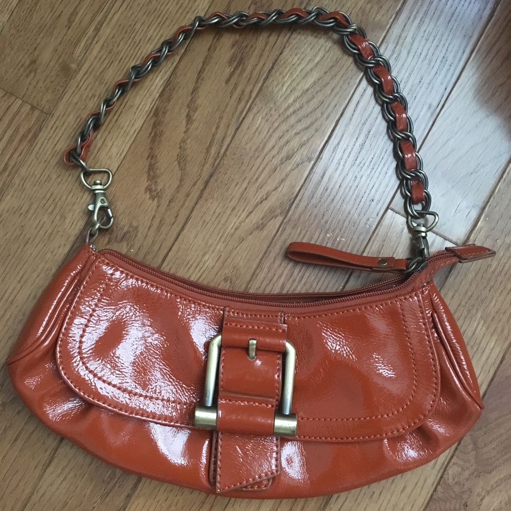 Gently used Adrienne Vittadini orange mini purse!
